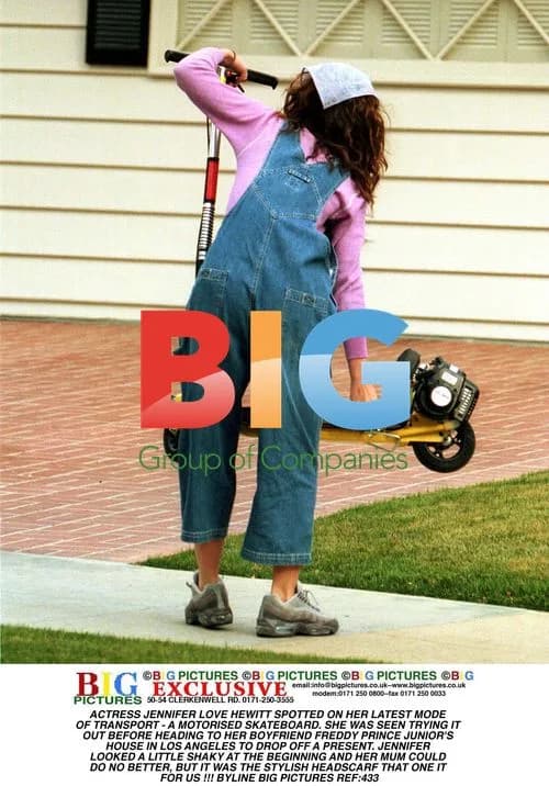 Jennifer Love Hewitt on Motorized Skateboard