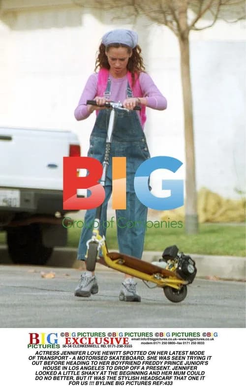 Jennifer Love Hewitt on Motorized Skateboard