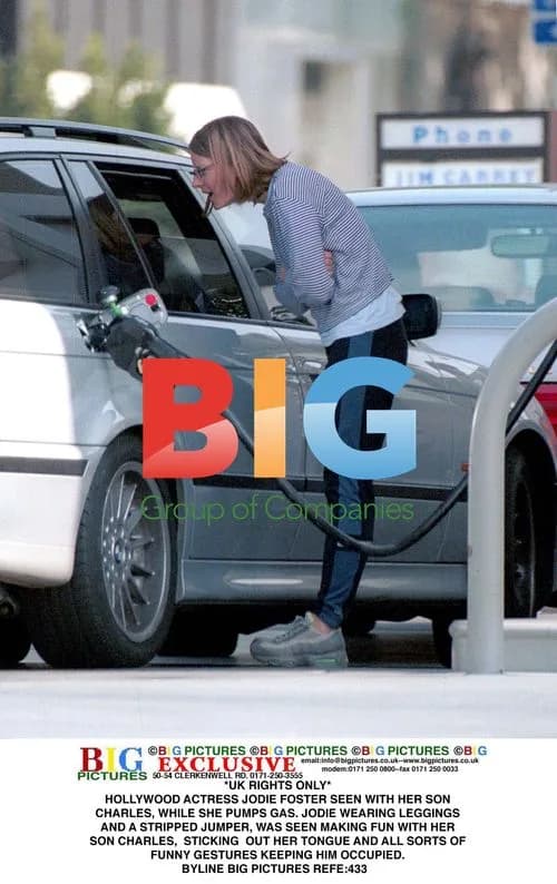 Jodie Foster Pumps Gas with Son