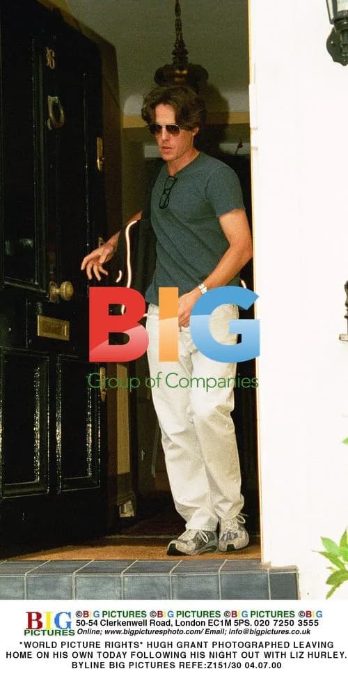 Hugh Grant Photographed Leaving Home