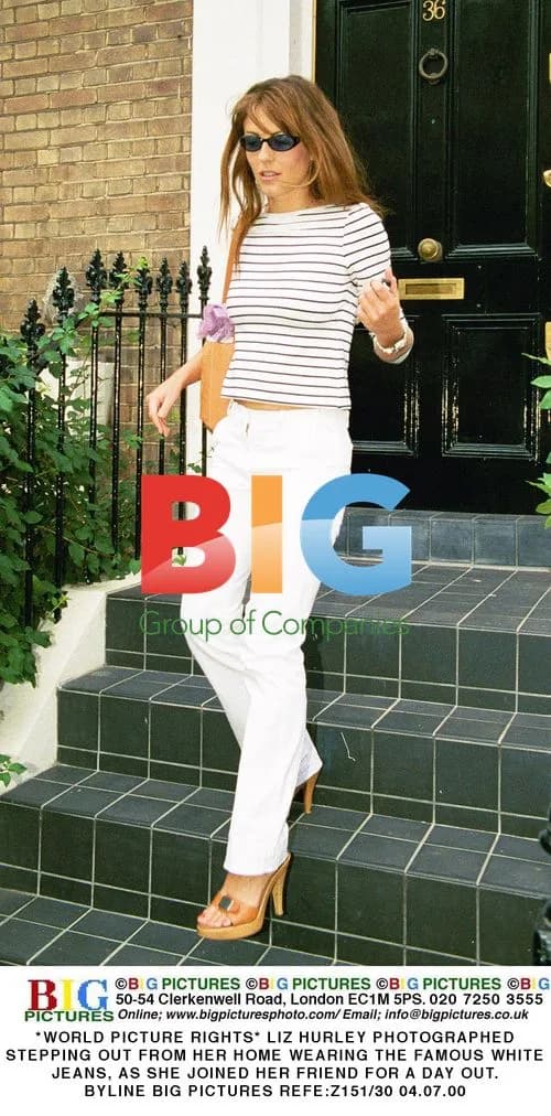 Liz Hurley Steps Out in Famous White Jeans