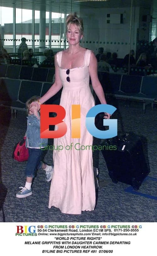 Melanie Griffiths with daughter Carmen departing Heathrow