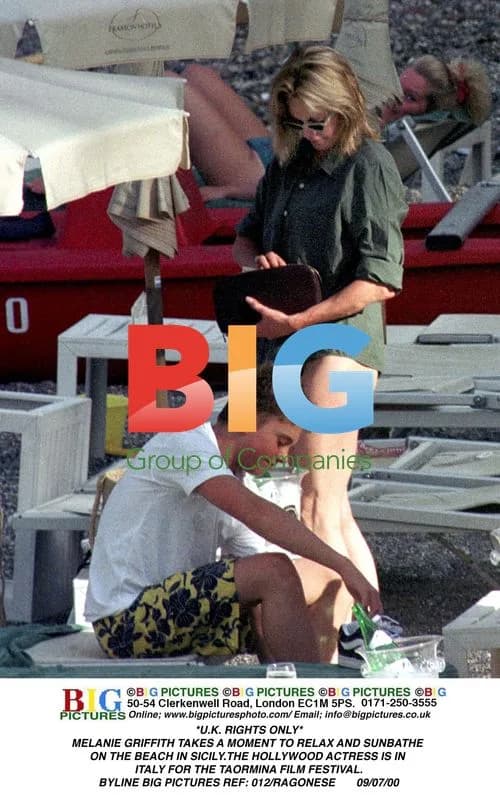Melanie Griffith Relaxes on Beach in Sicily