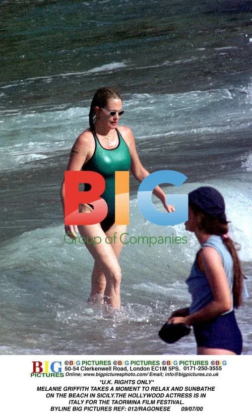 Melanie Griffith Sunbathes in Sicily