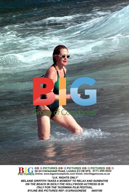 Melanie Griffith Relaxes on Beach in Sicily