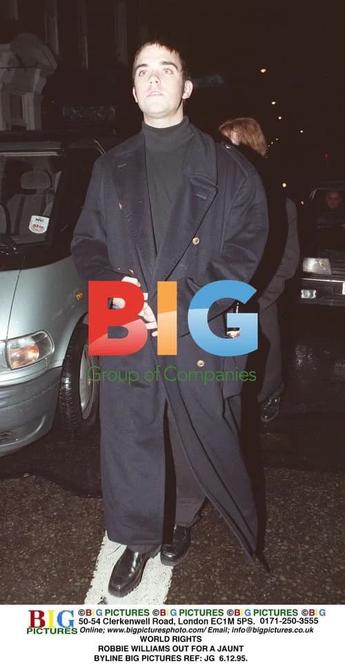 Robbie Williams out for a walk