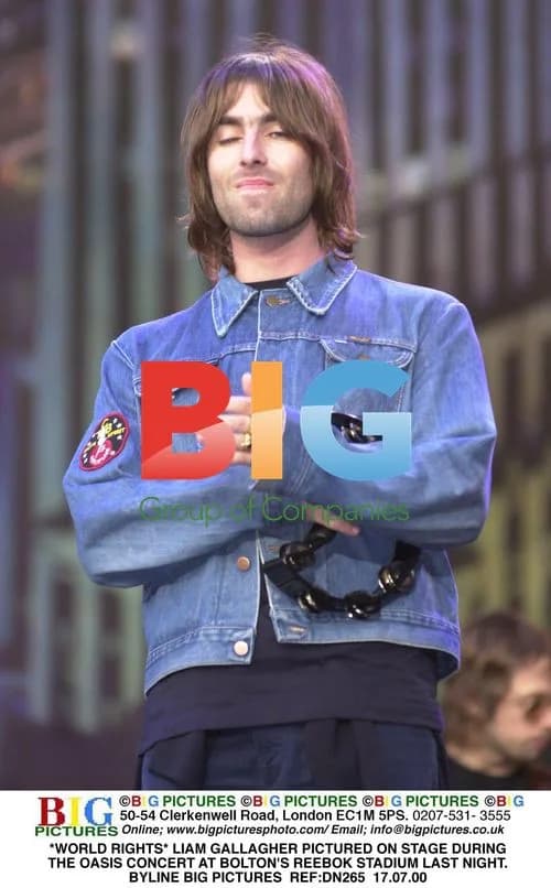 Liam Gallagher Performs with Oasis at Reebok Stadium