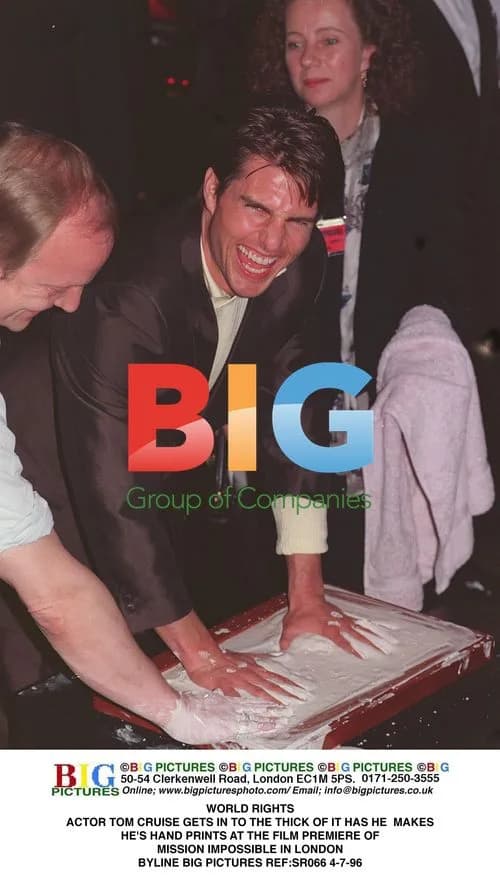 Tom Cruise Makes Hand Prints at Mission Impossible Premiere