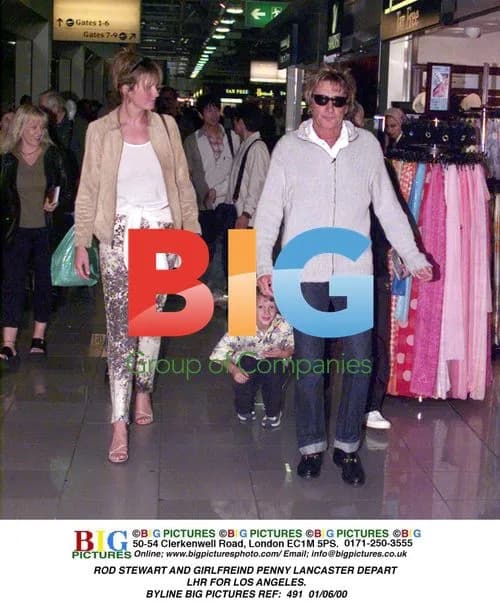 Rod Stewart and Penny Lancaster Depart Heathrow