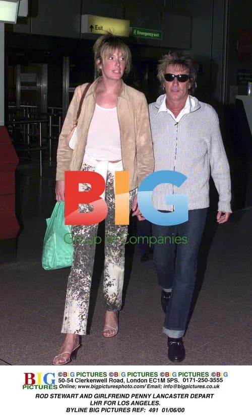 Rod Stewart and Penny Lancaster depart Heathrow