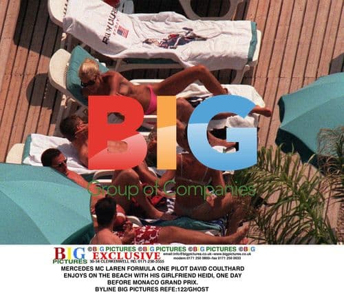 David Coulthard and girlfriend Heidi on the beach