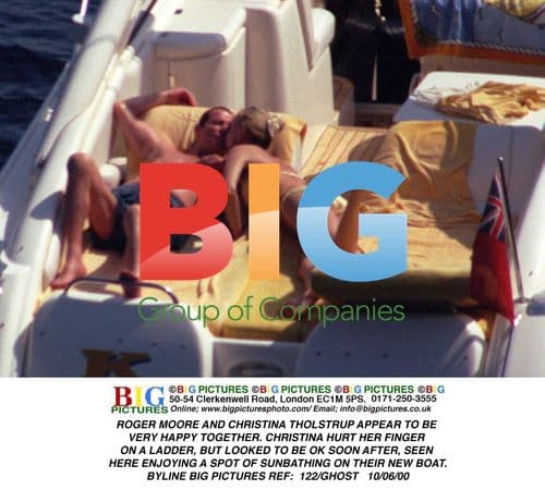 Roger Moore and Christina Tholstrup Relaxing on Boat