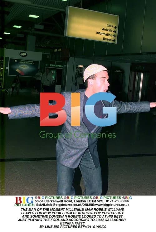 Robbie Williams Leaves for New York