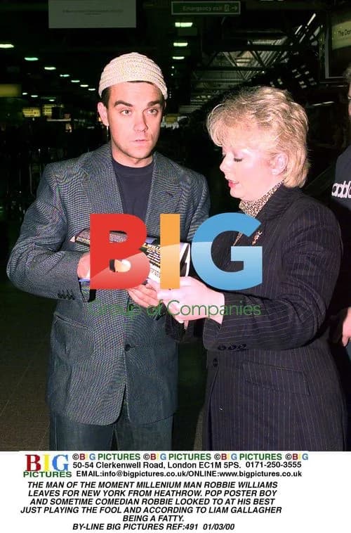 Robbie Williams Leaves for New York