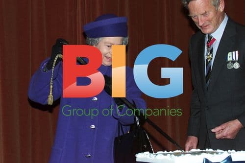 Queen cuts cake with naval sword