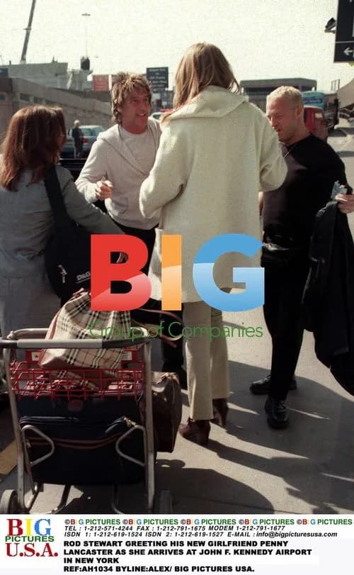 Rod Stewart Greets Girlfriend Penny Lancaster at JFK