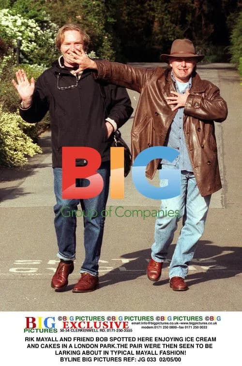 Rik Mayall and Friend Enjoy London Park