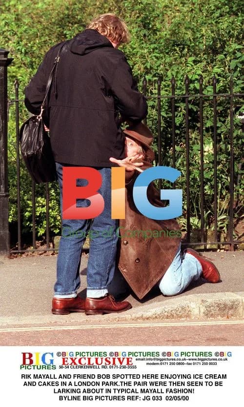 Rik Mayall and Friend Enjoying London Park