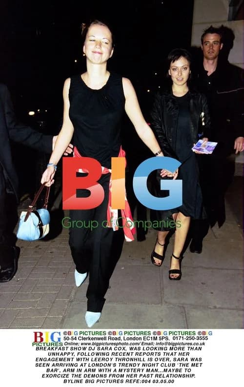 Sara Cox seen with mystery man