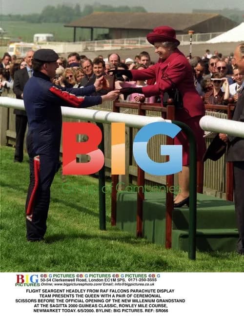 RAF Parachutist Presents Scissors to Queen