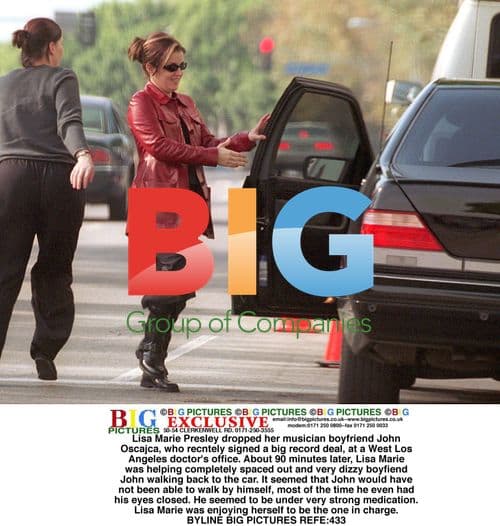 Lisa Marie Presley Helps Dizzy Boyfriend