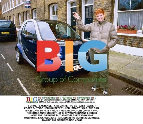 Patsy Palmer Poses with 'Smart' Car