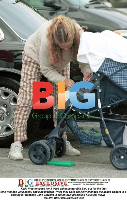 Kelly Preston and family out with newborn