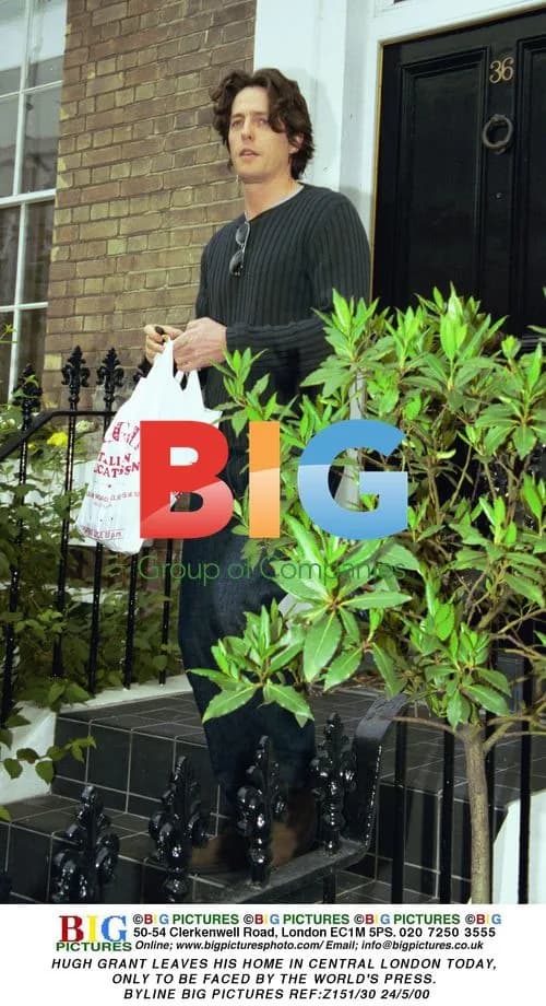 Hugh Grant Leaves Home in Central London