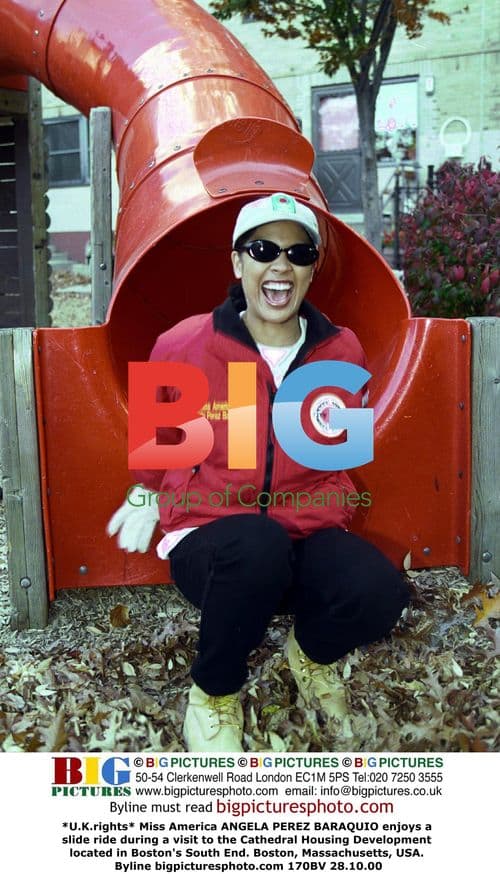 Miss America Angela Perez Baraquio Enjoys Slide in Boston