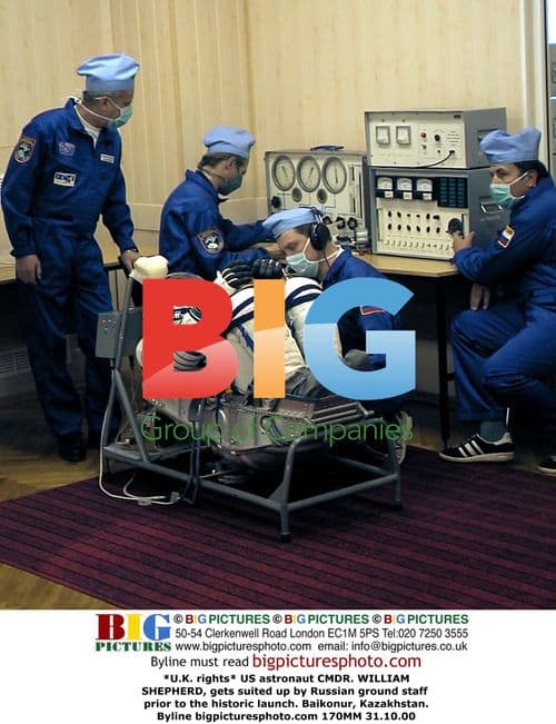 U.S. astronaut CMDR. WILLIAM SHEPHERD suits up in Baikonur