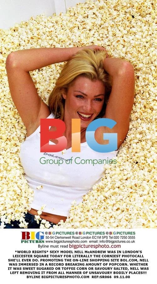 Nell McAndrew Immersed in Popcorn at Photocall