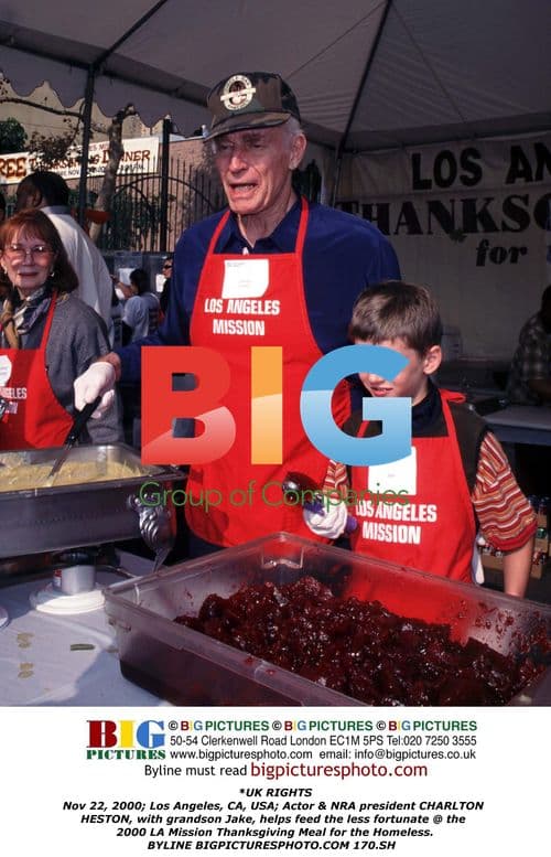 Charlton Heston helps feed homeless at LA Mission