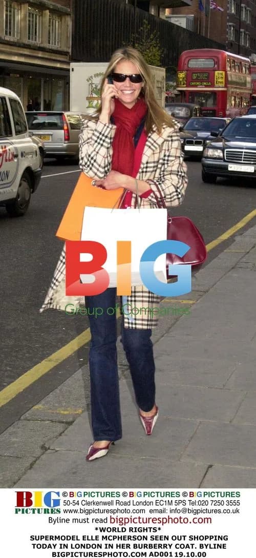 SUPERMODEL ELLE MCPHERSON SEEN SHOPPING IN LONDON
