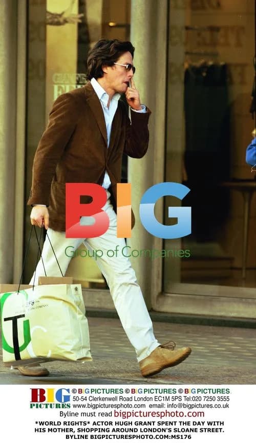 Hugh Grant Shops With Mother on Sloane Street