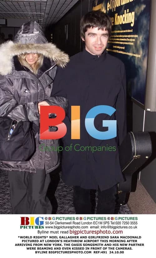 Noel Gallagher and Sara Macdonald at Heathrow