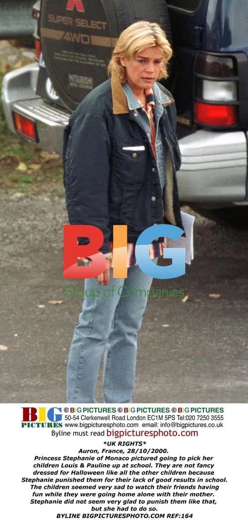 Princess Stephanie of Monaco picks up children