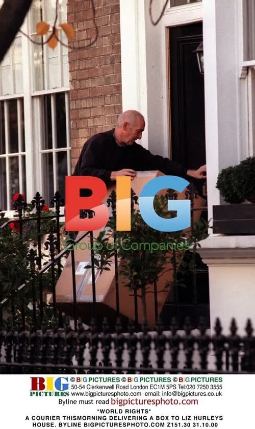 Courier Delivering Box to Liz Hurley's House