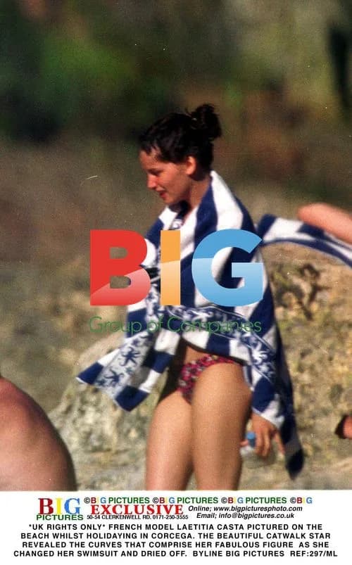 Laetitia Casta Pictured on Beach