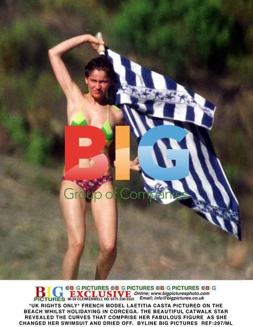 Laetitia Casta on Beach in Corcega
