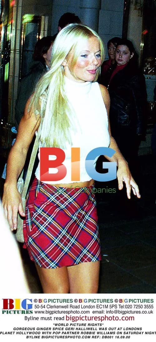 Geri Halliwell and Robbie Williams at Planet Hollywood