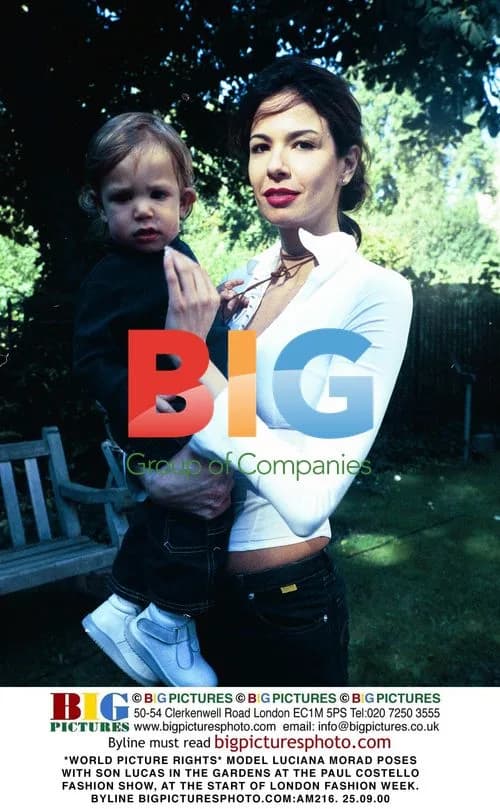 Luciana Morad Poses with Son at Paul Costello Fashion Show