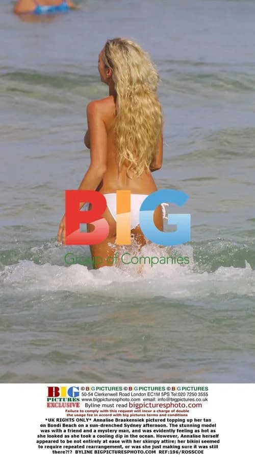 Annalise Braakensiek Sunbathes on Bondi Beach