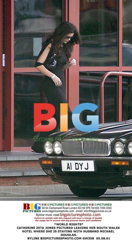 Catherine Zeta-Jones Leaves Hotel