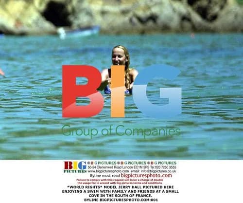 Model Jerry Hall Swims with Family in France