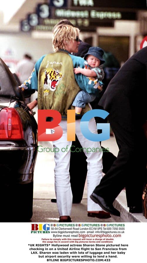 Sharon Stone Checks In for Flight at LAX