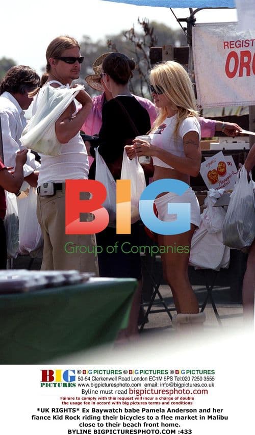 Pamela Anderson and Kid Rock on Bikes in Malibu