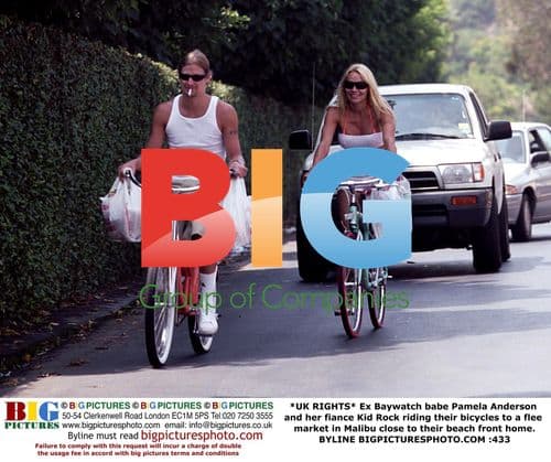 Pamela Anderson and Kid Rock Ride Bikes in Malibu