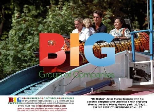 Pierce Brosnan with adopted daughter at Euro Disney