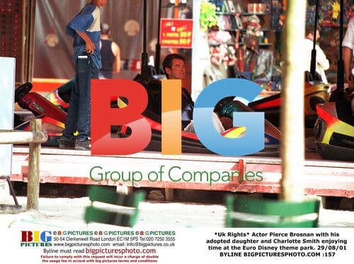 Pierce Brosnan with daughter at Euro Disney