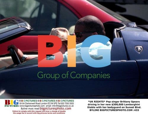 Britney Spears Drives Lamborghini with Bodyguard